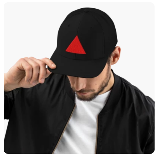 Model wearing a black cap with a red triangle logo on a white background

