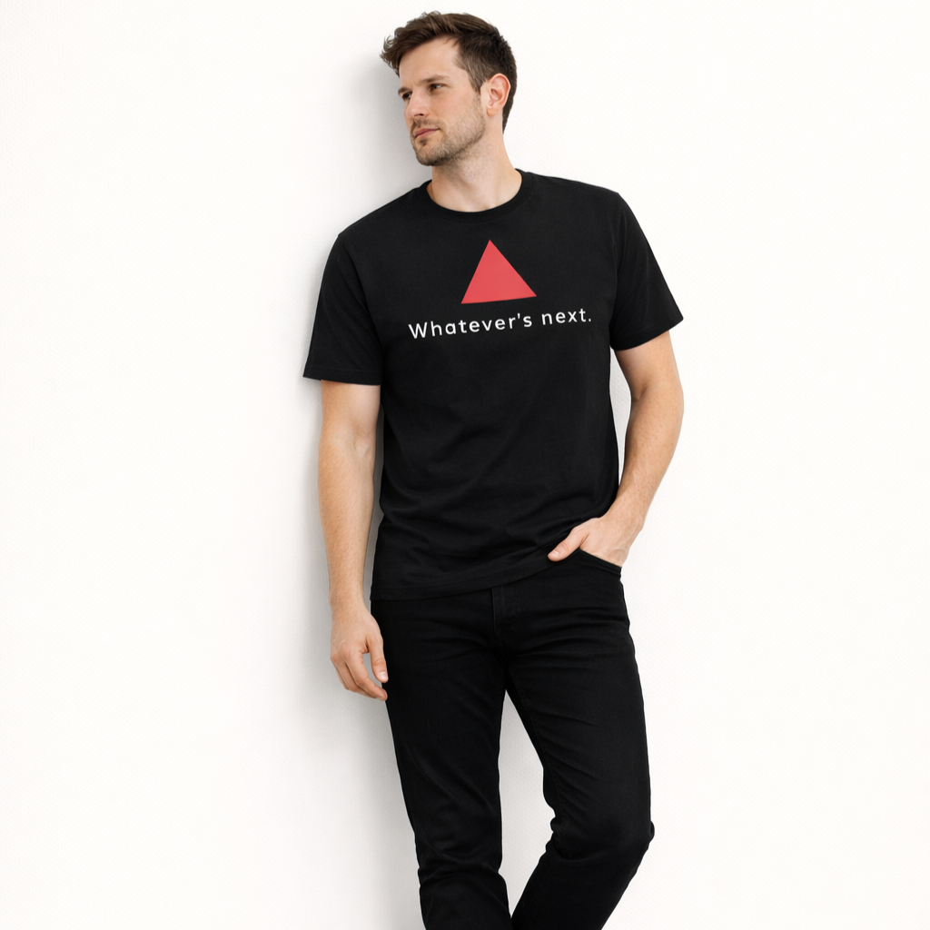 Model wearing a black t-shirt with a red triangle and text, clean background.