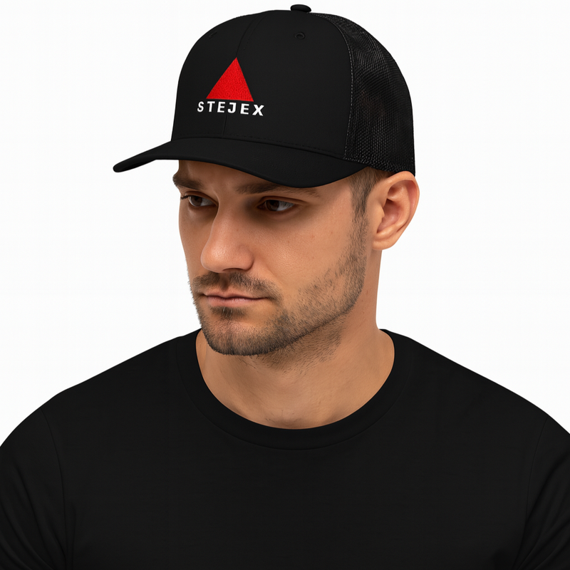 Model wearing a black trucker cap with a triangle logo and text, clean background.