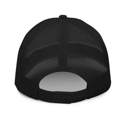Black Trucker cap back view on clan background.